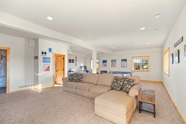 a living room with furniture and a couch