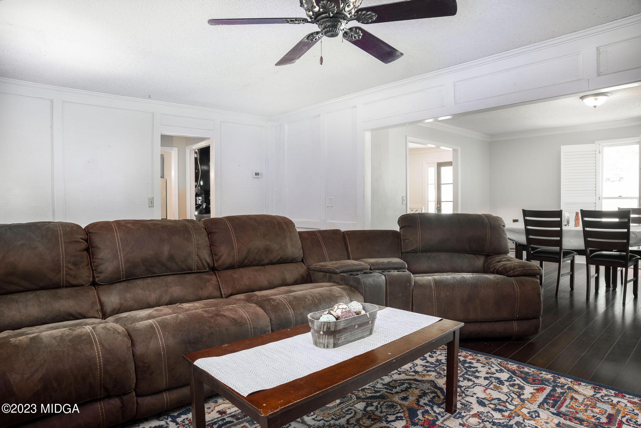 270 Castlegate Road Macon, GA 31210 - Photo 13 of 35 a living room with furniture rug and window