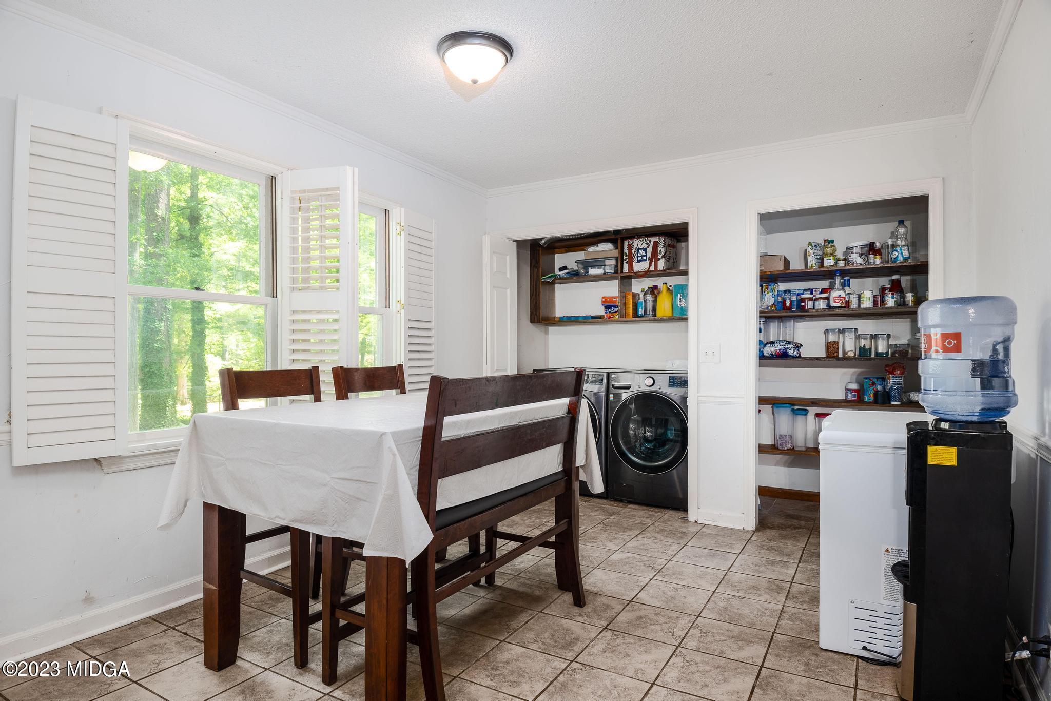 270 Castlegate Road Macon, GA 31210 - Photo 17 of 35 a view of a workspace with furniture and a window