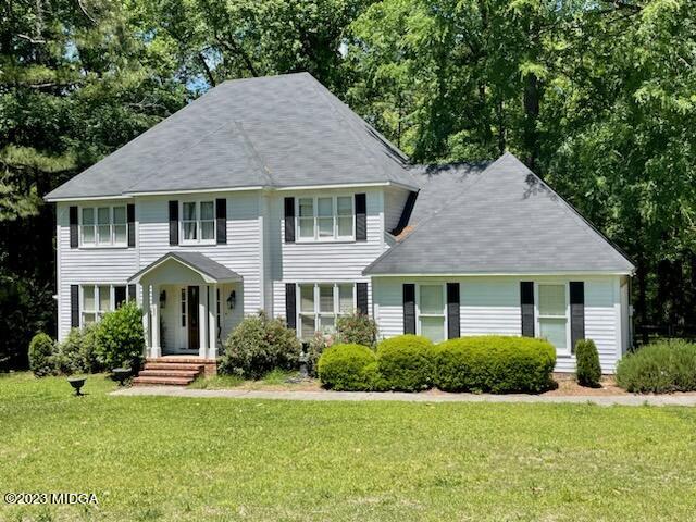 270 Castlegate Road Macon, GA 31210 - Photo 24 of 35 a front view of a house with a yard