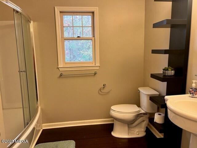270 Castlegate Road Macon, GA 31210 - Photo 32 of 35 a white toilet sitting next to a bathroom sink