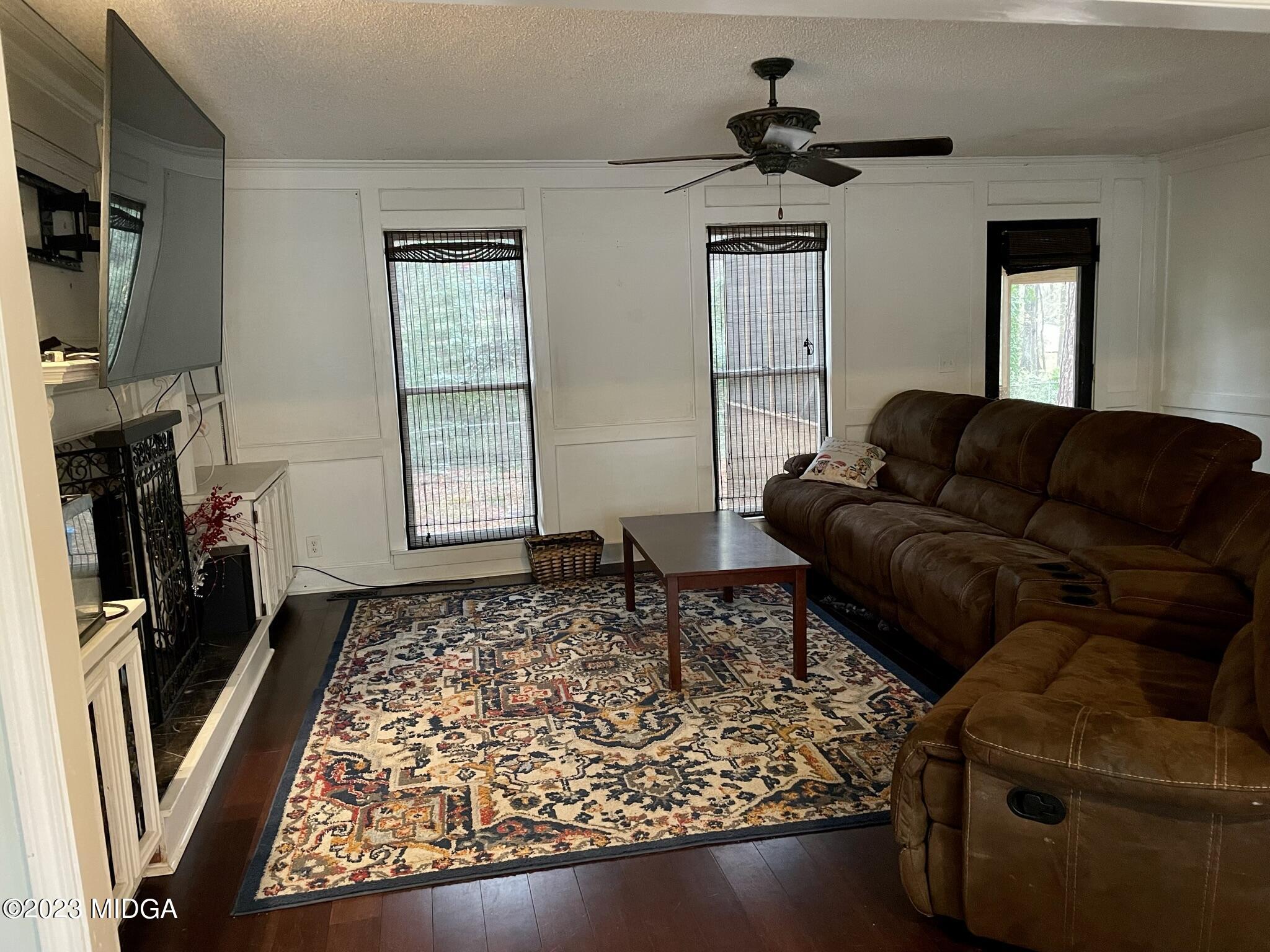 270 Castlegate Road Macon, GA 31210 - Photo 33 of 35 a living room with furniture or couch and a fireplace