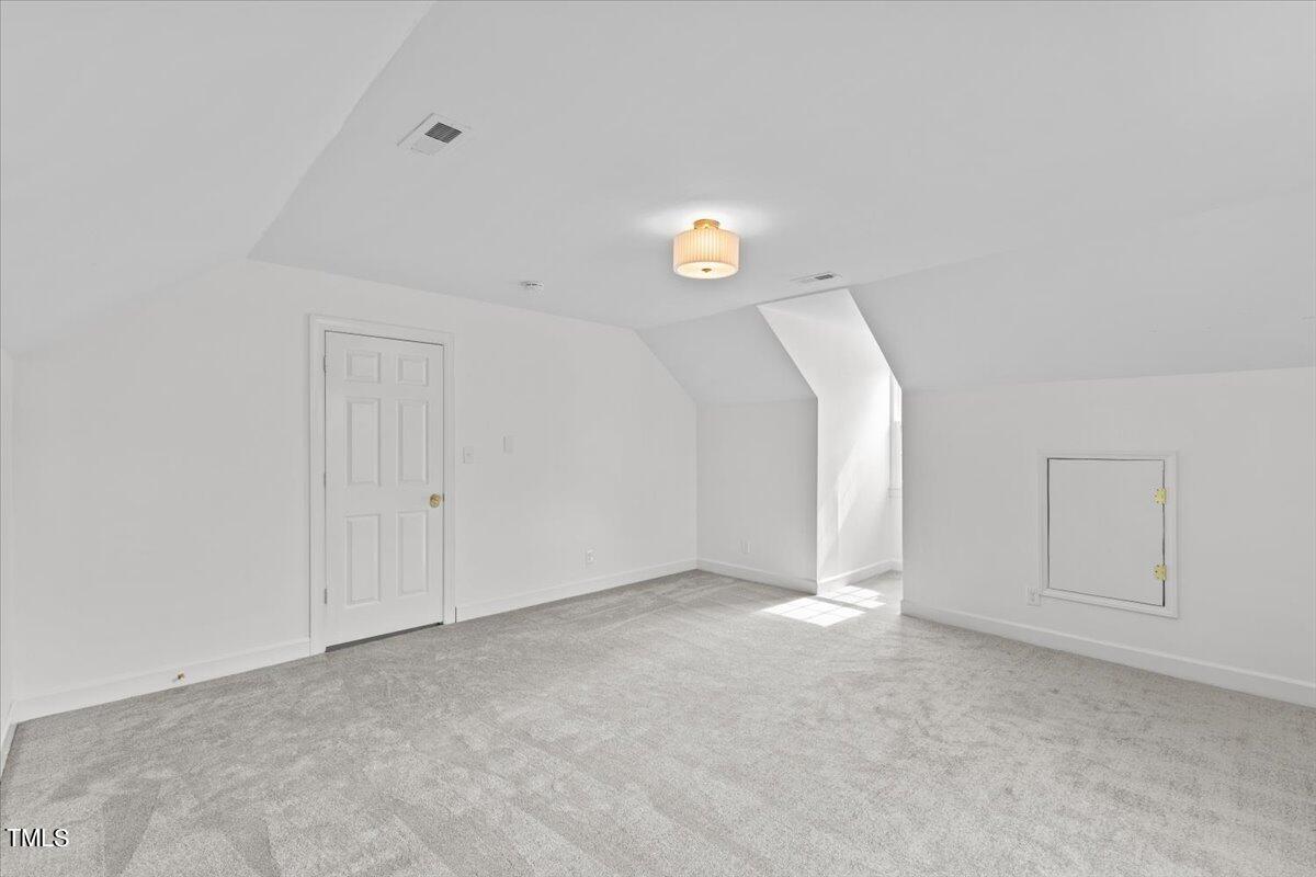 2117 Quail Ridge Road Raleigh, NC 27609 - Photo 54 of 67 a view of a room with windows