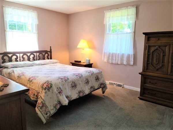 8 Fencourt Road Canton, MA 02021 - Photo 12 of 33 a bedroom with a bed next to a window
