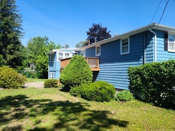 8 Fencourt Road Canton, MA 02021 - Photo 16 of 33 a front view of a house with a yard