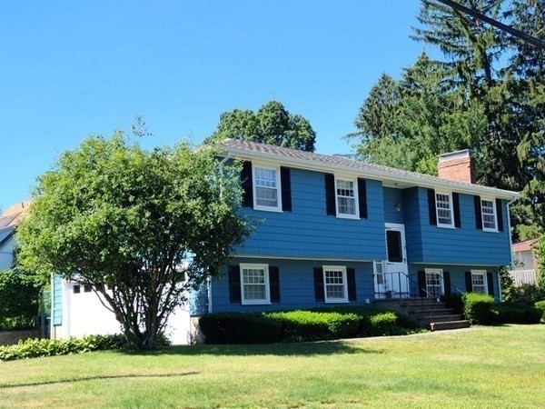 8 Fencourt Road Canton, MA 02021 - Photo 20 of 33 a front view of a house with garden