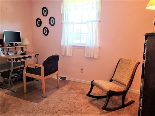 8 Fencourt Road Canton, MA 02021 - Photo 21 of 33 a room with a chair and a window