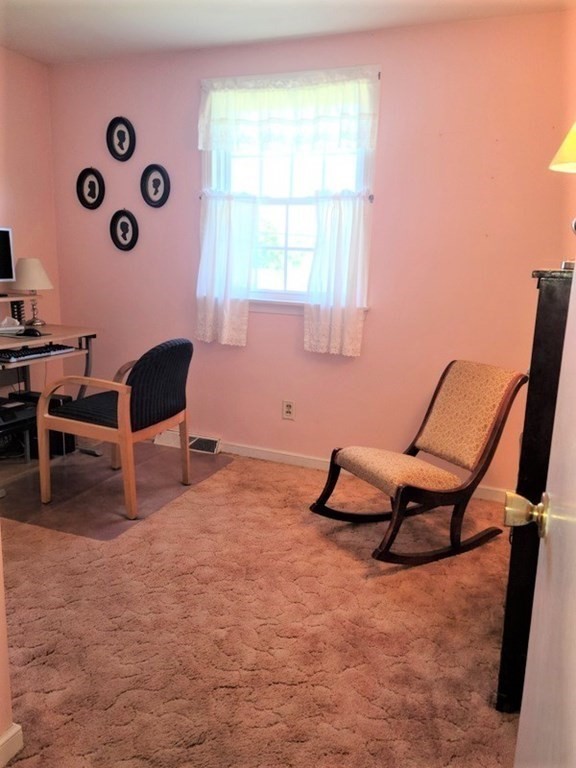 8 Fencourt Road Canton, MA 02021 - Photo 22 of 33 a living room with furniture and a window