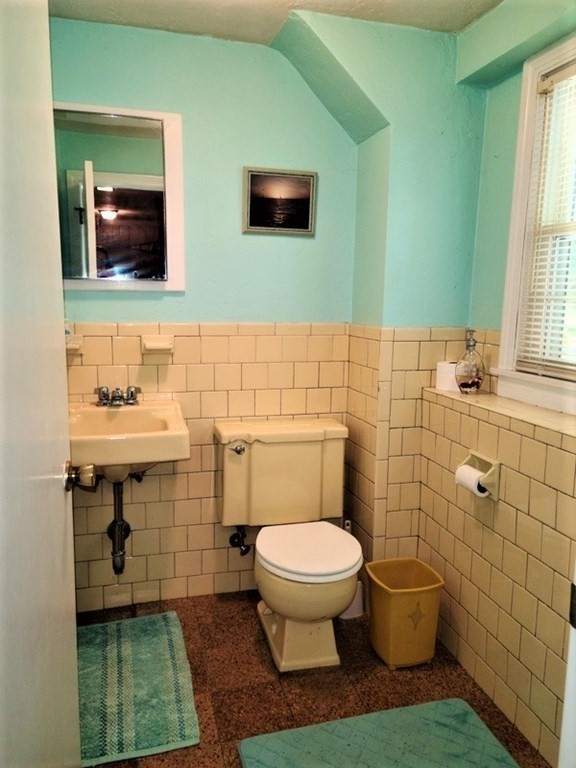 8 Fencourt Road Canton, MA 02021 - Photo 26 of 33 a bathroom with a sink a toilet and mirror