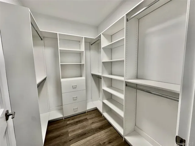 a view of an empty walk in closet