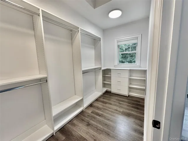 a view of an empty walk in closet