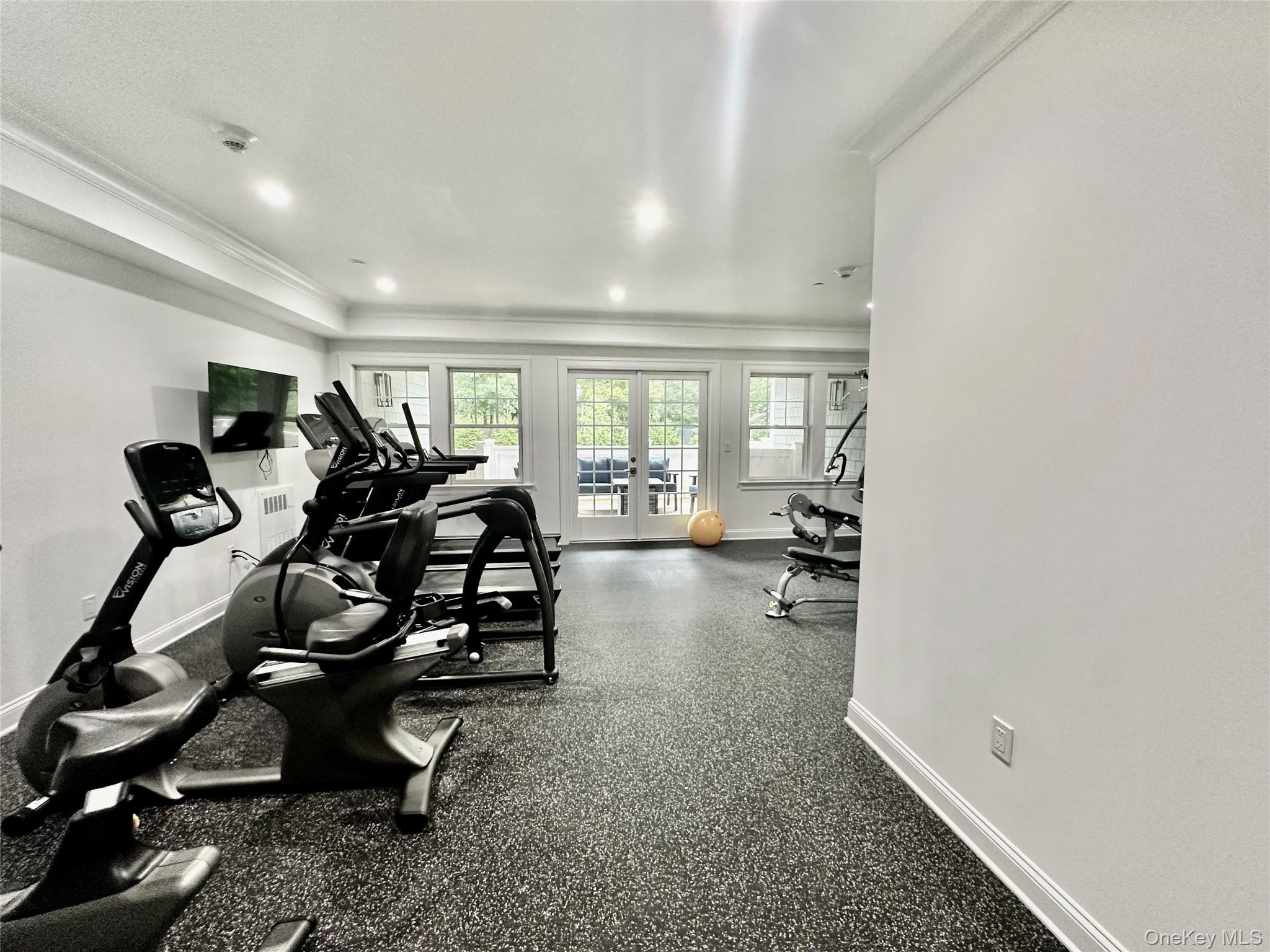 585 Main Street Armonk, NY 10504 - Photo 6 of 19 a room with gym equipment and a window