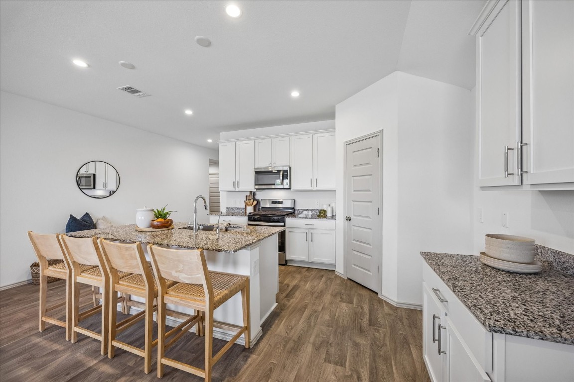 3505 Rockefeller Road Texas City, TX 77591 - Photo 8 of 23 Spacious island offers ample prep space and doubles as a breakfast bar.