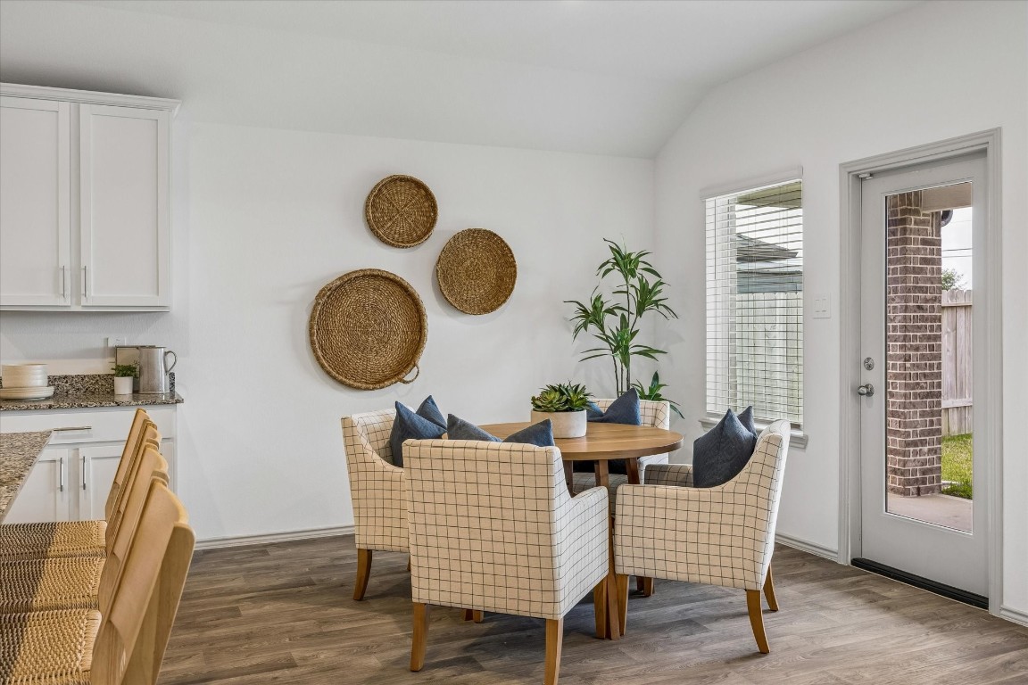 3505 Rockefeller Road Texas City, TX 77591 - Photo 9 of 23 Dining area filled with natural light, creating a bright and airy atmosphere.