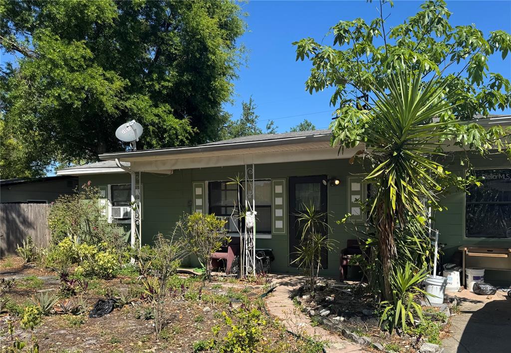 722 Belair Avenue Lakeland, FL 33801 - Photo 1 of 14 a view of a house with potted plants