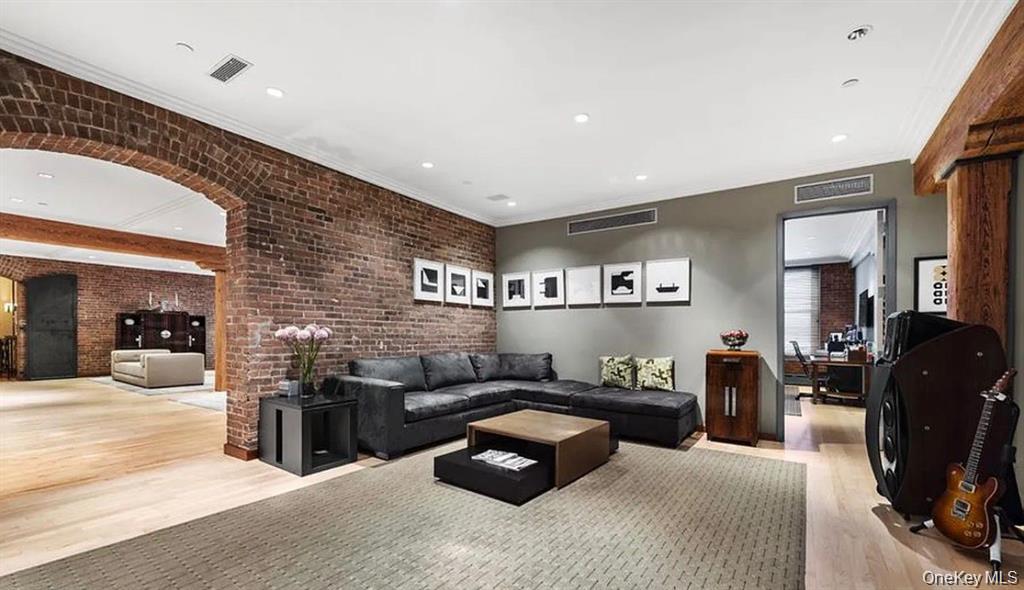 500 Greenwich Street, Unit 401 Manhattan, NY 10013 - Photo 12 of 22 a bedroom with furniture and large windows