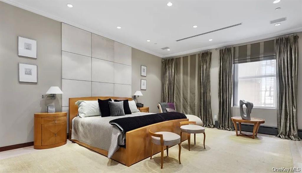 500 Greenwich Street, Unit 401 Manhattan, NY 10013 - Photo 14 of 22 a bedroom with furniture and a large window