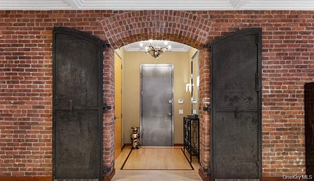 500 Greenwich Street, Unit 401 Manhattan, NY 10013 - Photo 17 of 22 a view of a entryway door of the building