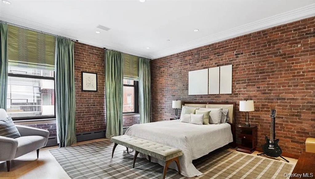 500 Greenwich Street, Unit 401 Manhattan, NY 10013 - Photo 20 of 22 a bedroom with a bed wooden floor and window