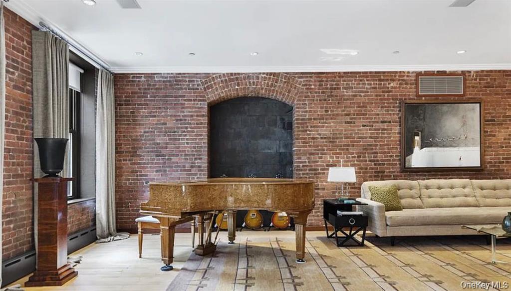 500 Greenwich Street, Unit 401 Manhattan, NY 10013 - Photo 3 of 22 a living room with furniture and a fireplace