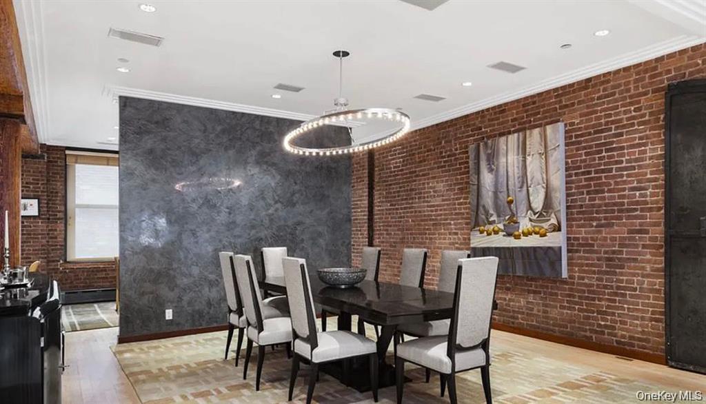 500 Greenwich Street, Unit 401 Manhattan, NY 10013 - Photo 7 of 22 a dining room with furniture and window