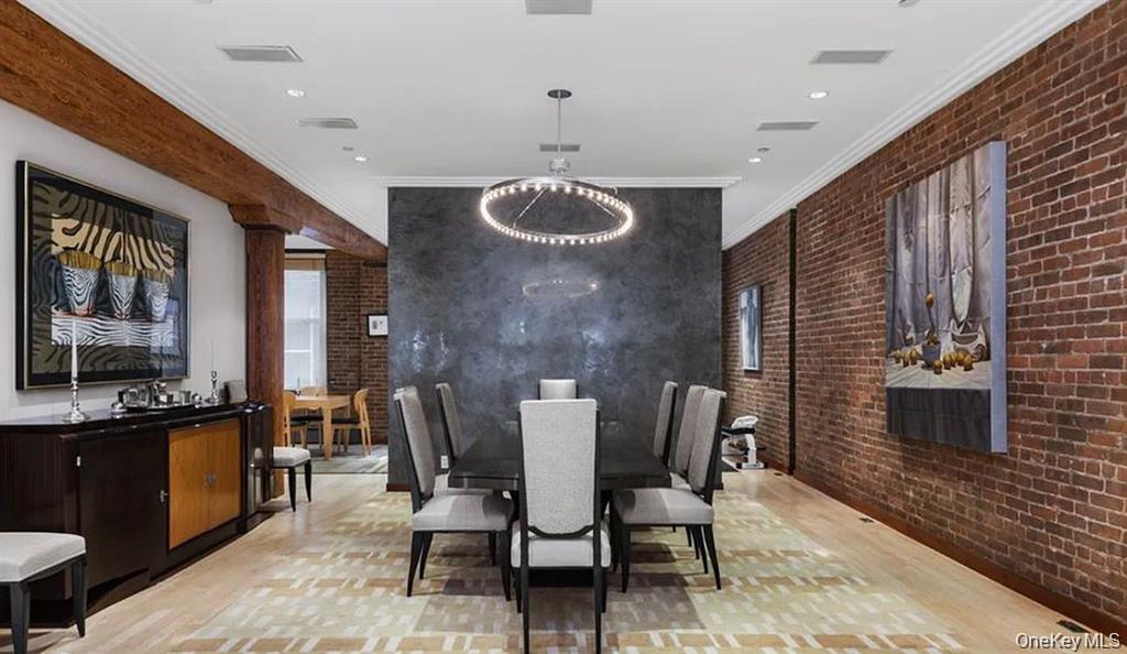 500 Greenwich Street, Unit 401 Manhattan, NY 10013 - Photo 8 of 22 a dining room with furniture and window