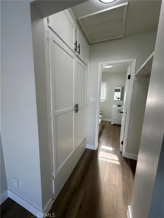 a view of entryway with wooden floor