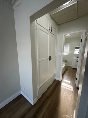 a view of entryway with wooden floor