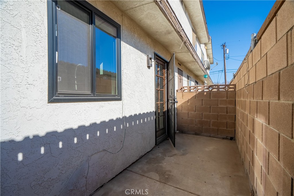 38478 Larkin Avenue, Unit B Palmdale, CA 93550 - Photo 8 of 8 a view of a pathway of a house