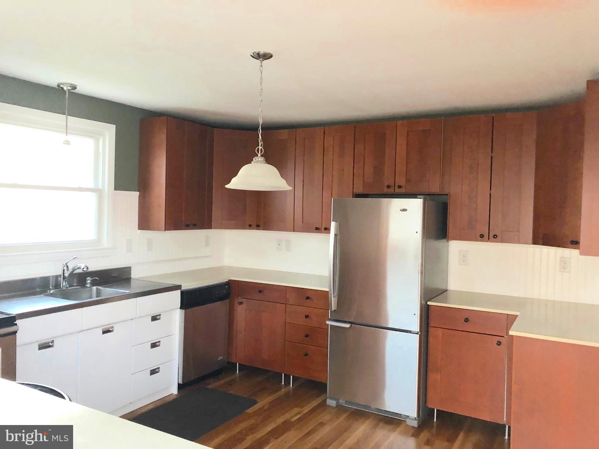 119 Montrose Road Pasadena, MD 21122 - Photo 2 of 10 Kitchen with loads of cabinet space.