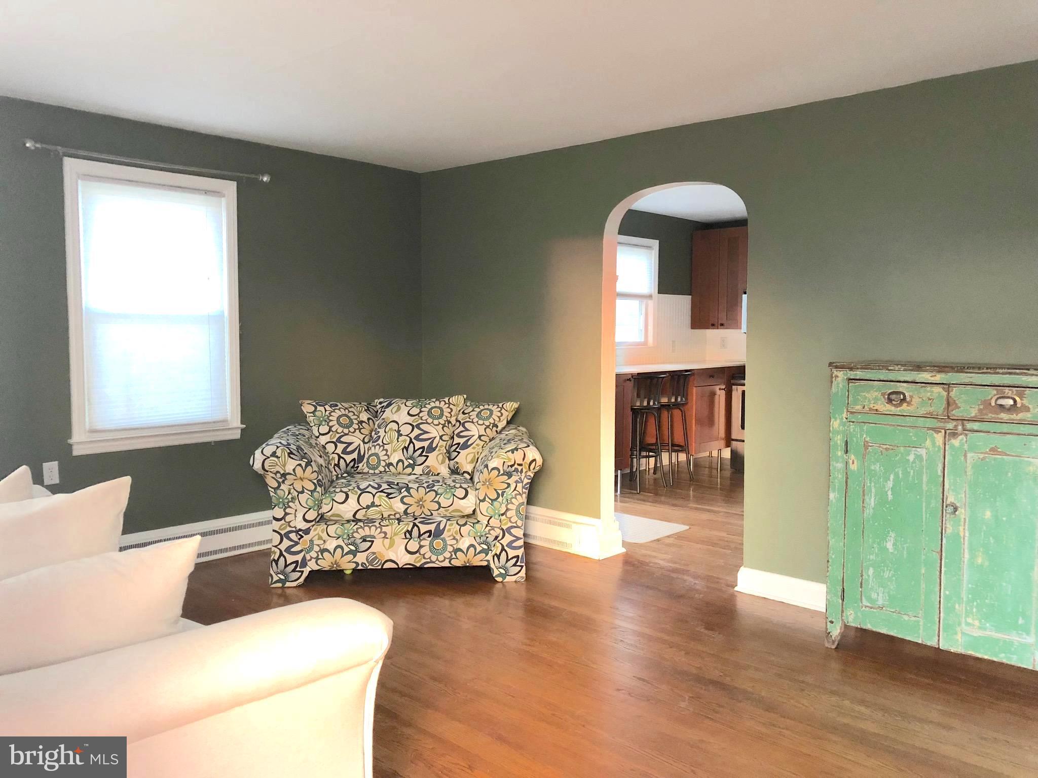 119 Montrose Road Pasadena, MD 21122 - Photo 5 of 10 Living Room view into the kitchen