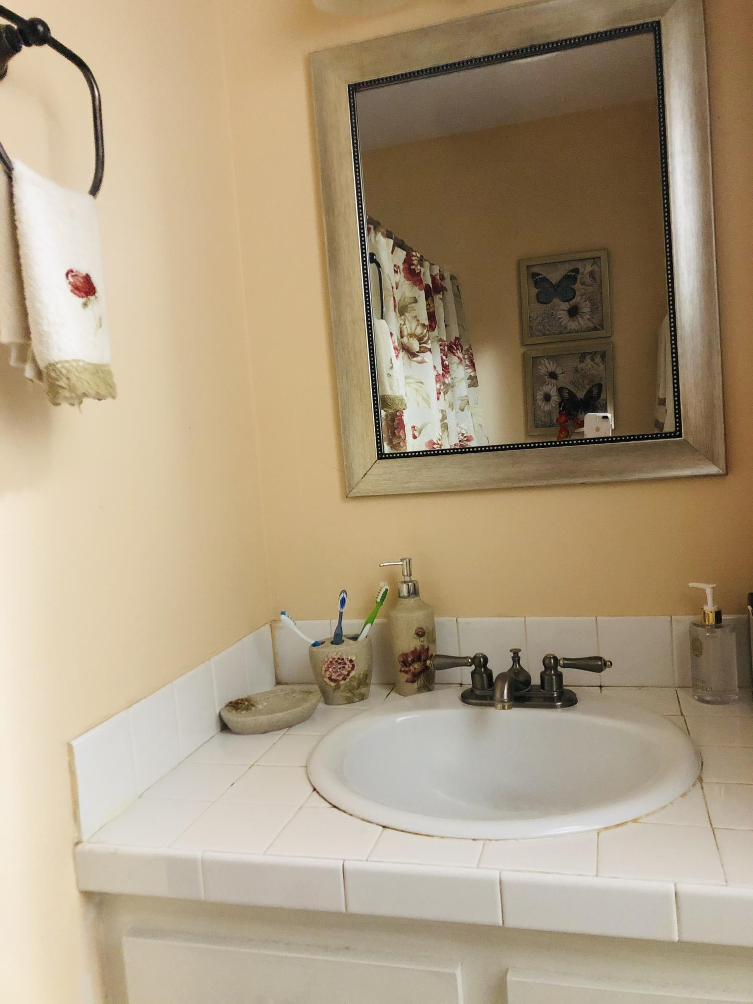 1790 Abbey Road, Unit 101 West Palm Beach, FL 33415 - Photo 18 of 23 MASTER BEDROOM