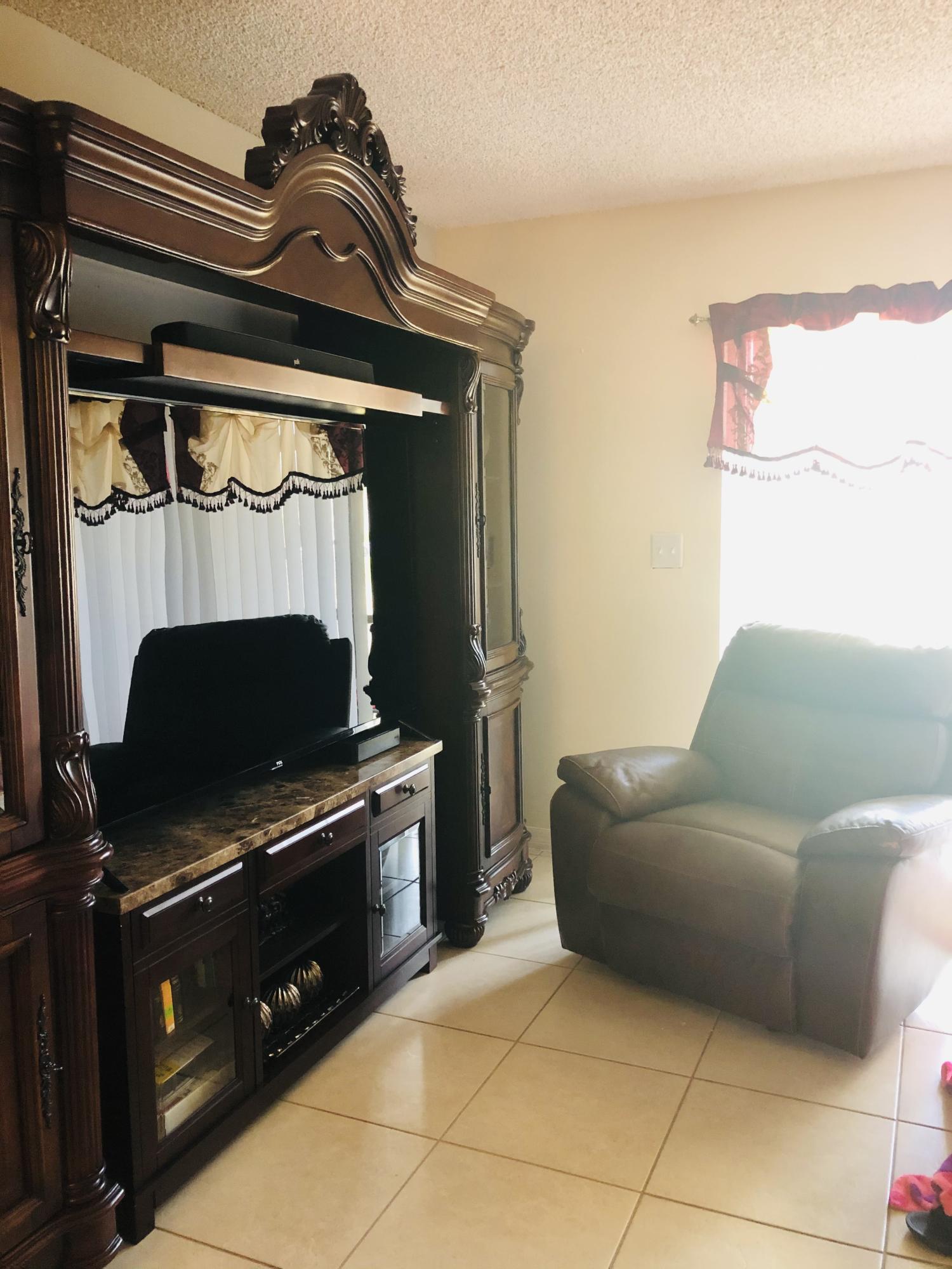 1790 Abbey Road, Unit 101 West Palm Beach, FL 33415 - Photo 2 of 23 IMG_7765