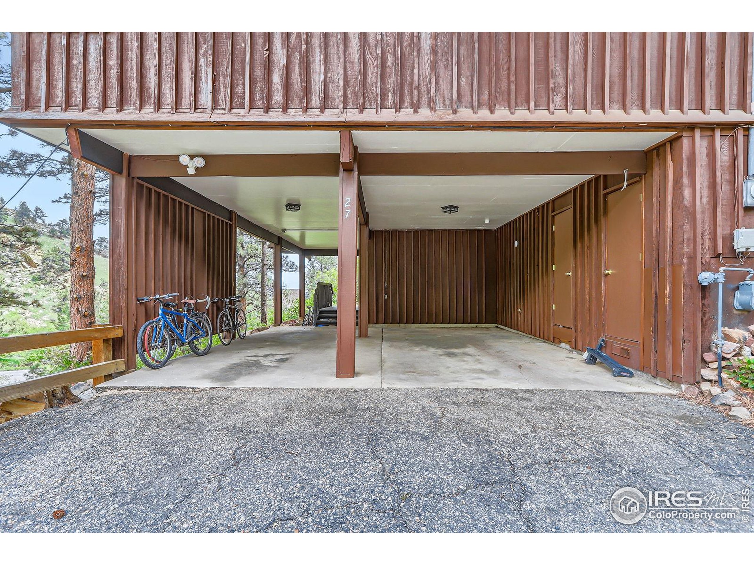 27 Arrowleaf Court Boulder, CO 80304 - Photo 28 of 29 a view of a livingroom with furniture and floor to ceiling window