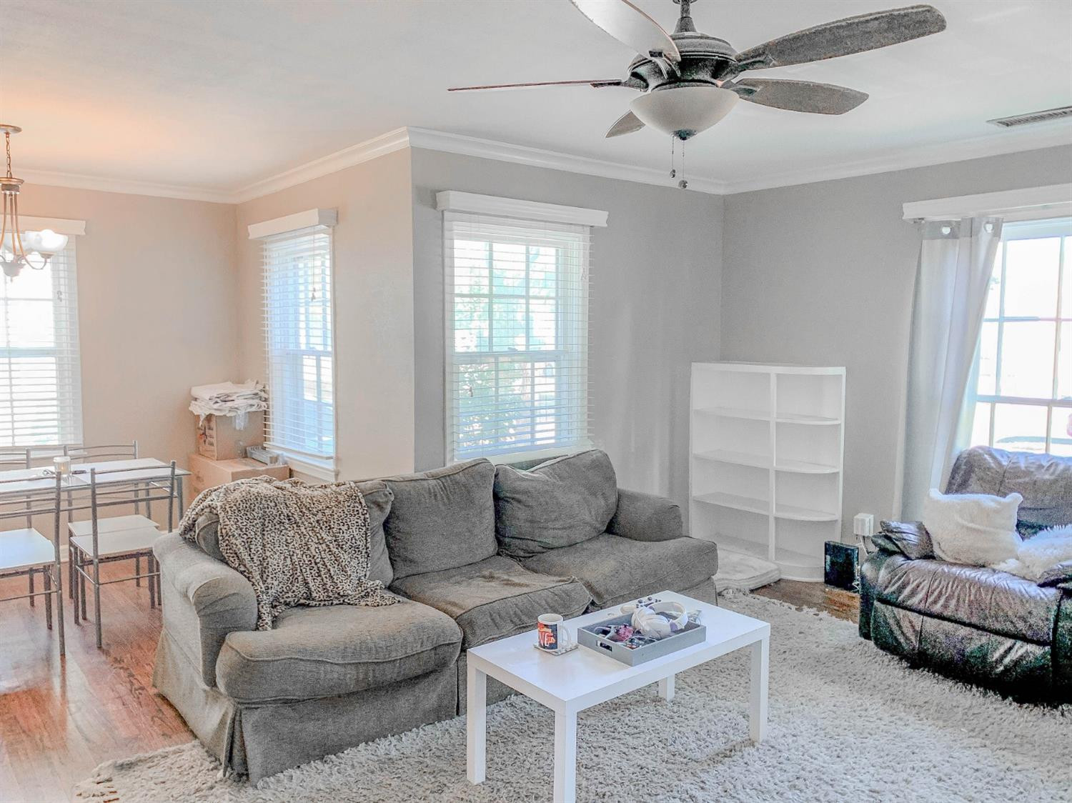 2401 26th Street Lubbock, TX 79411 - Photo 2 of 13 a living room with furniture and a large window