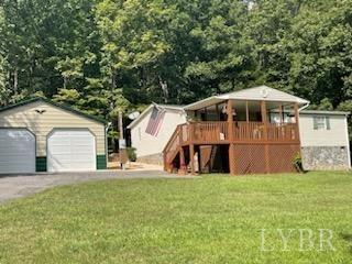 1065 Johnson Mountain Road Evington, VA 24550 - Photo 2 of 49 a front view of a house with garden
