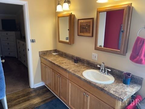 1065 Johnson Mountain Road Evington, VA 24550 - Photo 27 of 49 a bathroom with a granite countertop sink and a mirror
