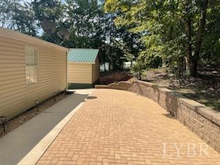 1065 Johnson Mountain Road Evington, VA 24550 - Photo 32 of 49 a view of backyard of the house