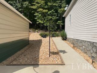 1065 Johnson Mountain Road Evington, VA 24550 - Photo 37 of 49 a view of a backyard with sitting area