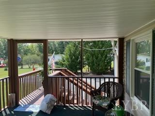 1065 Johnson Mountain Road Evington, VA 24550 - Photo 9 of 49 a view of a roof deck with wooden floor and fence