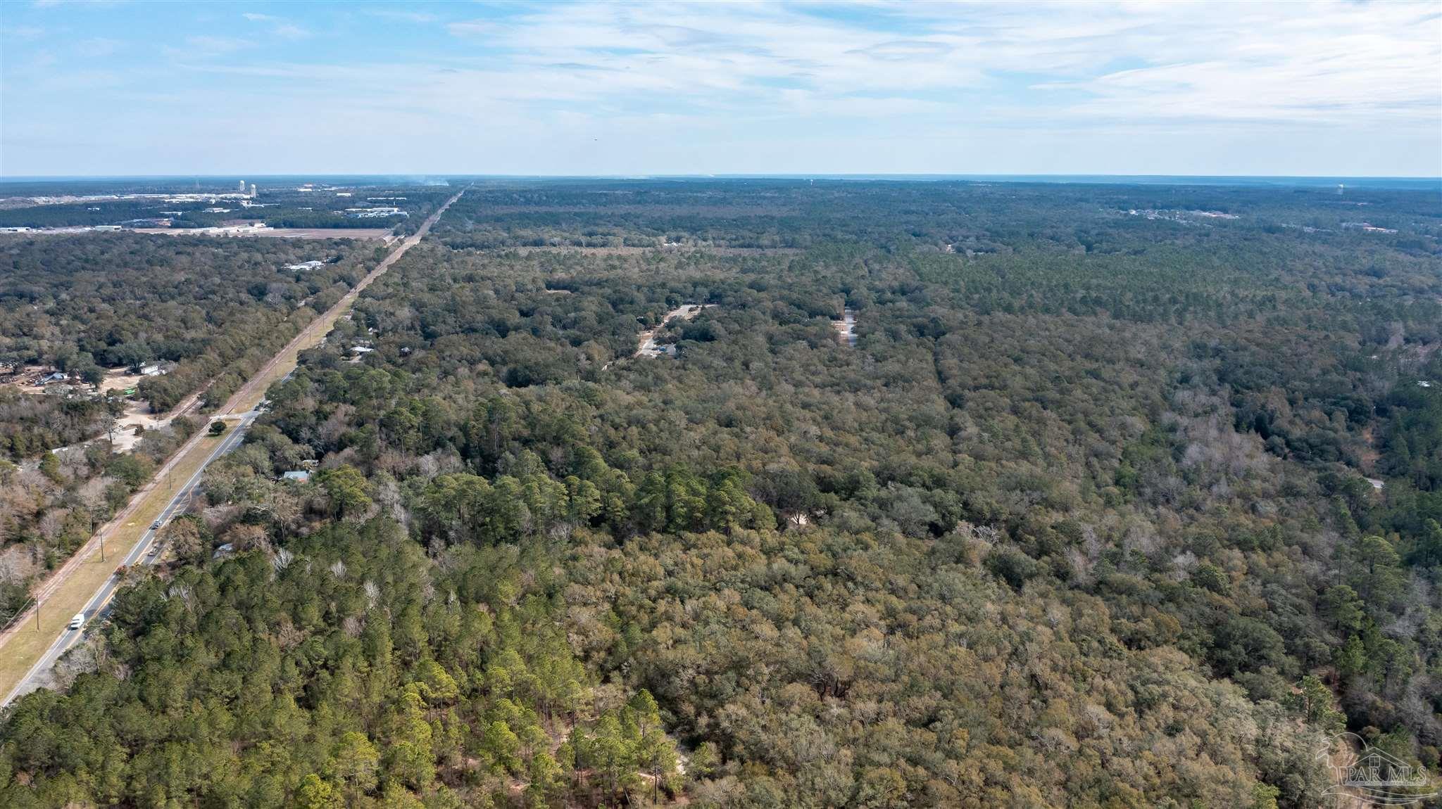 0 Hwy 90 Milton Milton, FL 32583 - Photo 6 of 8 an aerial view of residential house and green space
