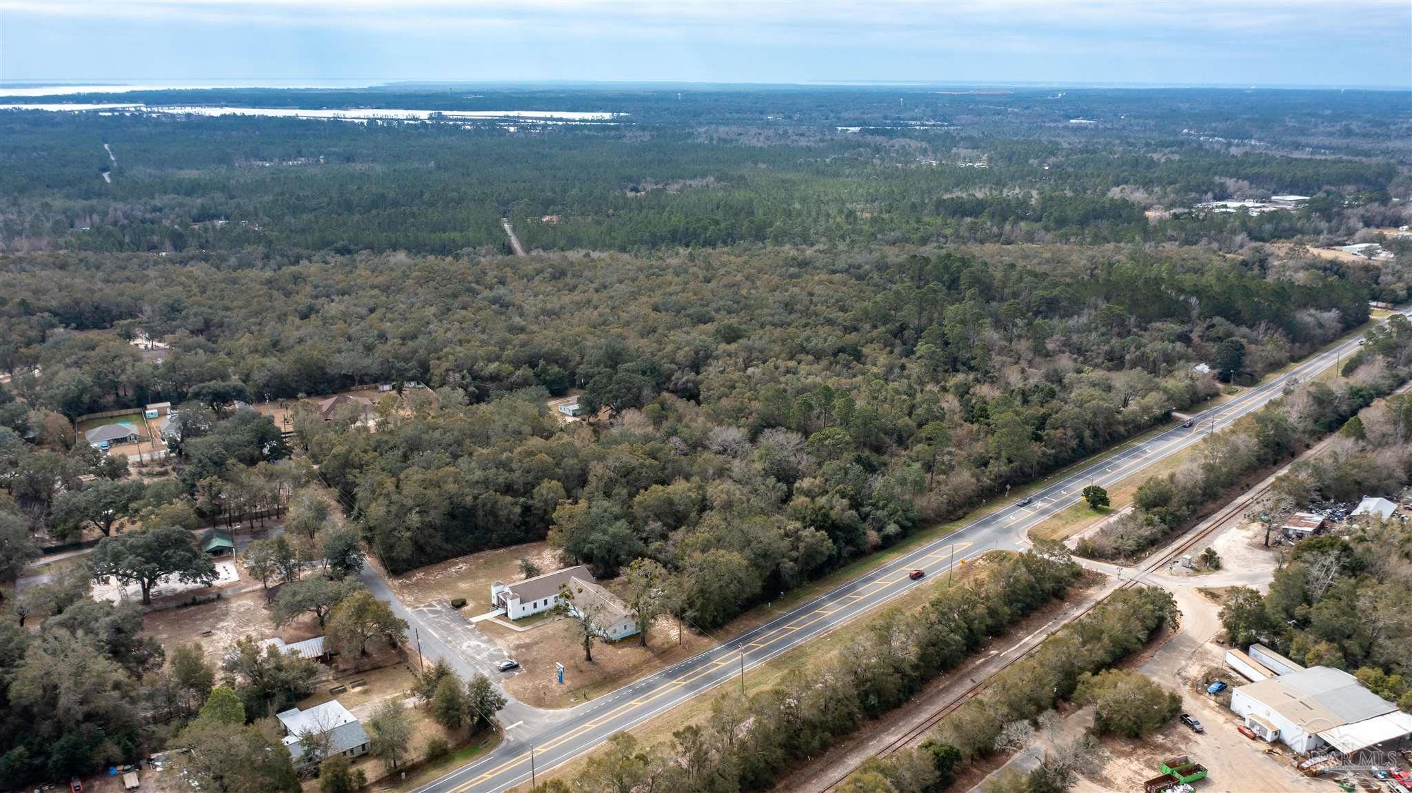 0 Hwy 90 Milton Milton, FL 32583 - Photo 8 of 8 a view of a city with mountain