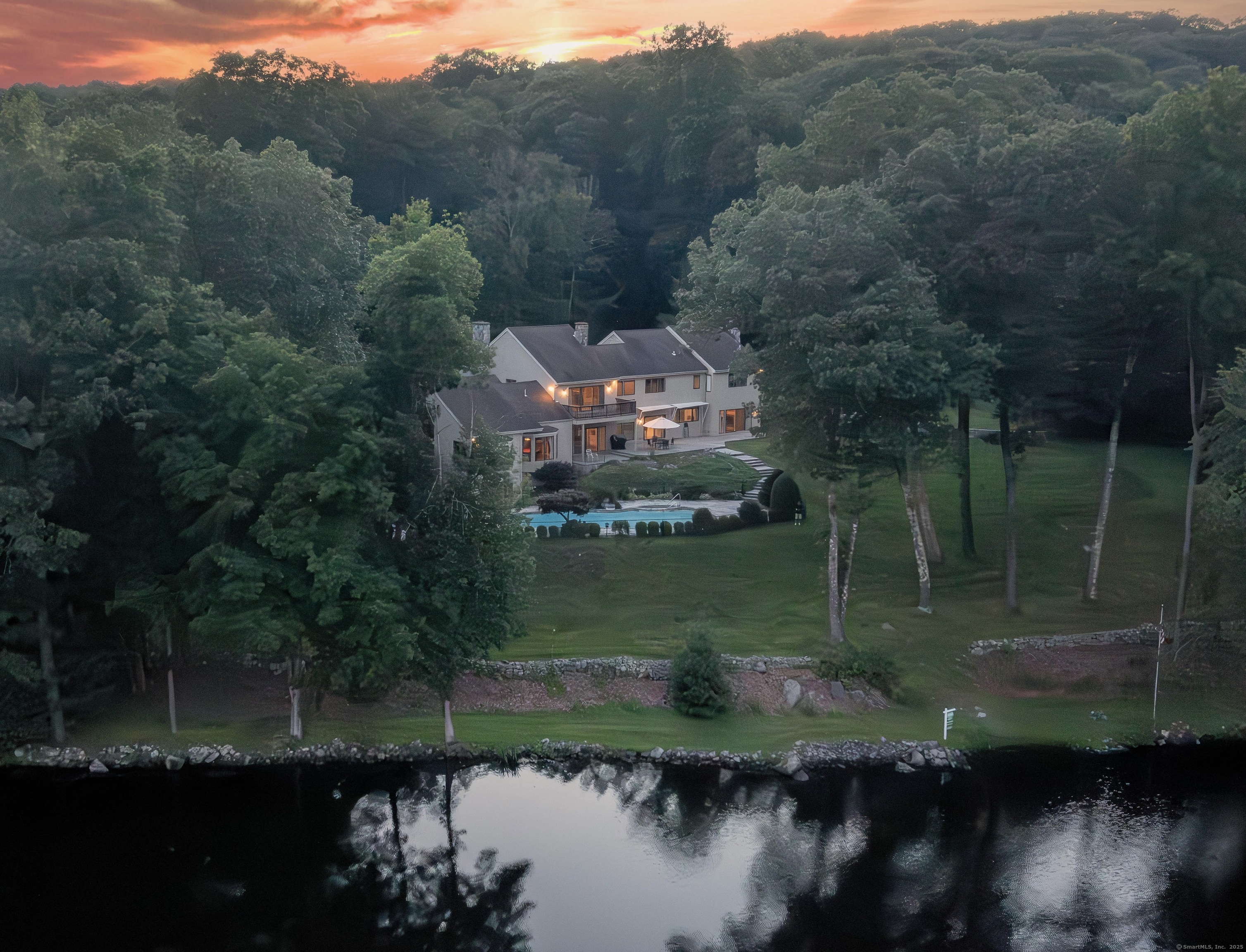 13 Cove Road Brookfield, CT 06804 - Photo 1 of 1 a view of a lake with a mountain in the background