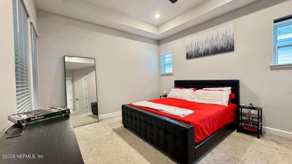 48 Bluebonnet Way St. Augustine, FL 32092 - Photo 13 of 46 a bedroom with a bed and dresser