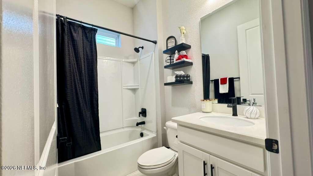 48 Bluebonnet Way St. Augustine, FL 32092 - Photo 18 of 46 a bathroom with a sink toilet and shower