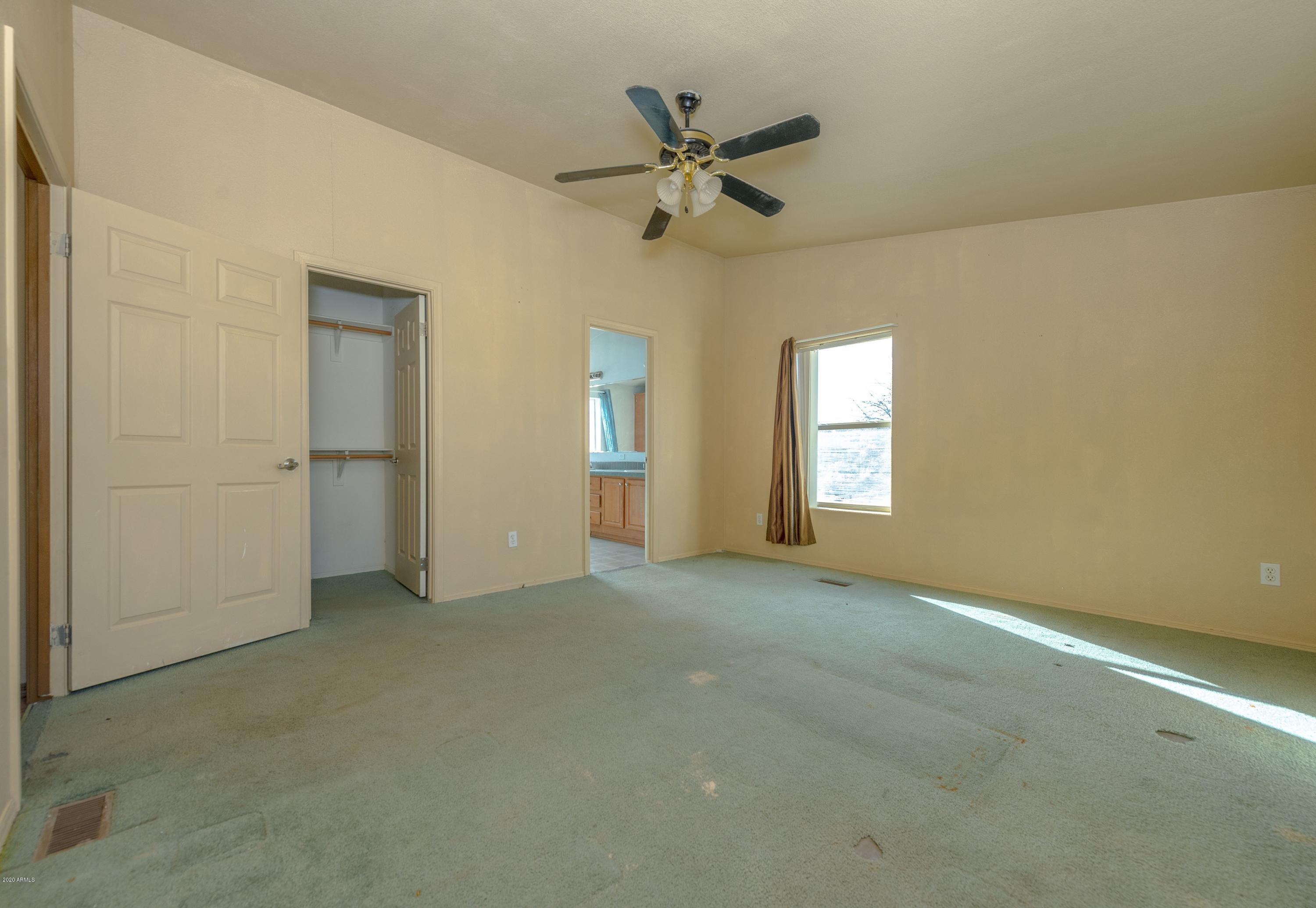 12545 Windmill Road Skull Valley, AZ 86338 - Photo 13 of 38 013_Master Bedroom