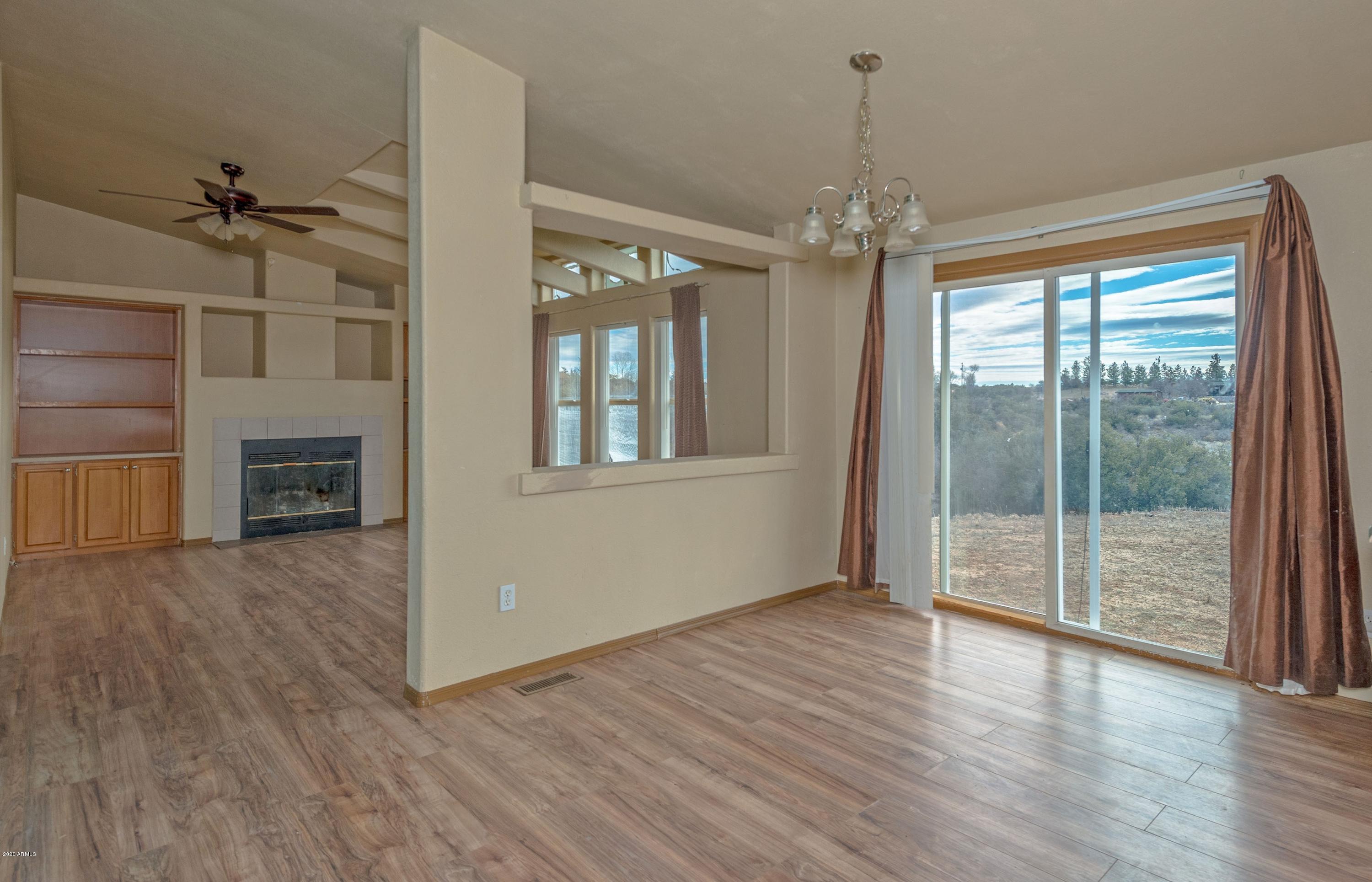 12545 Windmill Road Skull Valley, AZ 86338 - Photo 9 of 38 009_DiningFamily Room