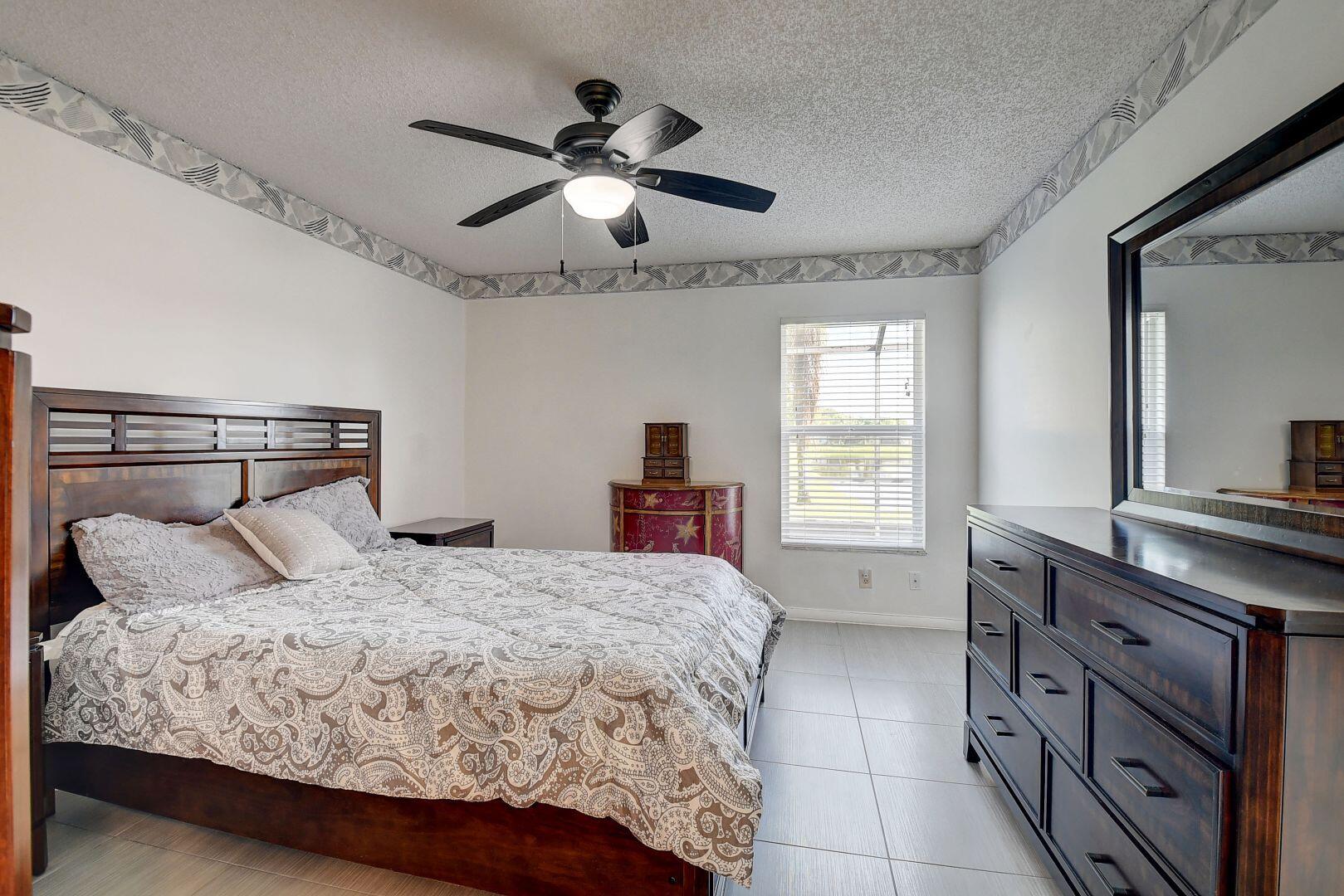 9111 Tracy Court, Unit 4 Boca Raton, FL 33496 - Photo 16 of 47 Master Bedroom