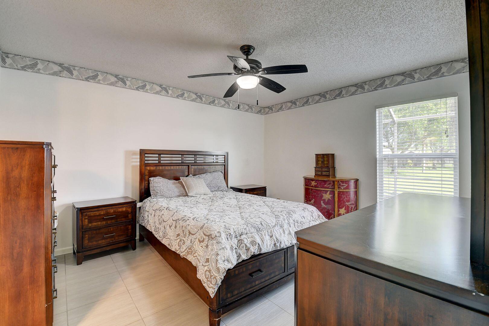 9111 Tracy Court, Unit 4 Boca Raton, FL 33496 - Photo 17 of 47 Master Bedroom