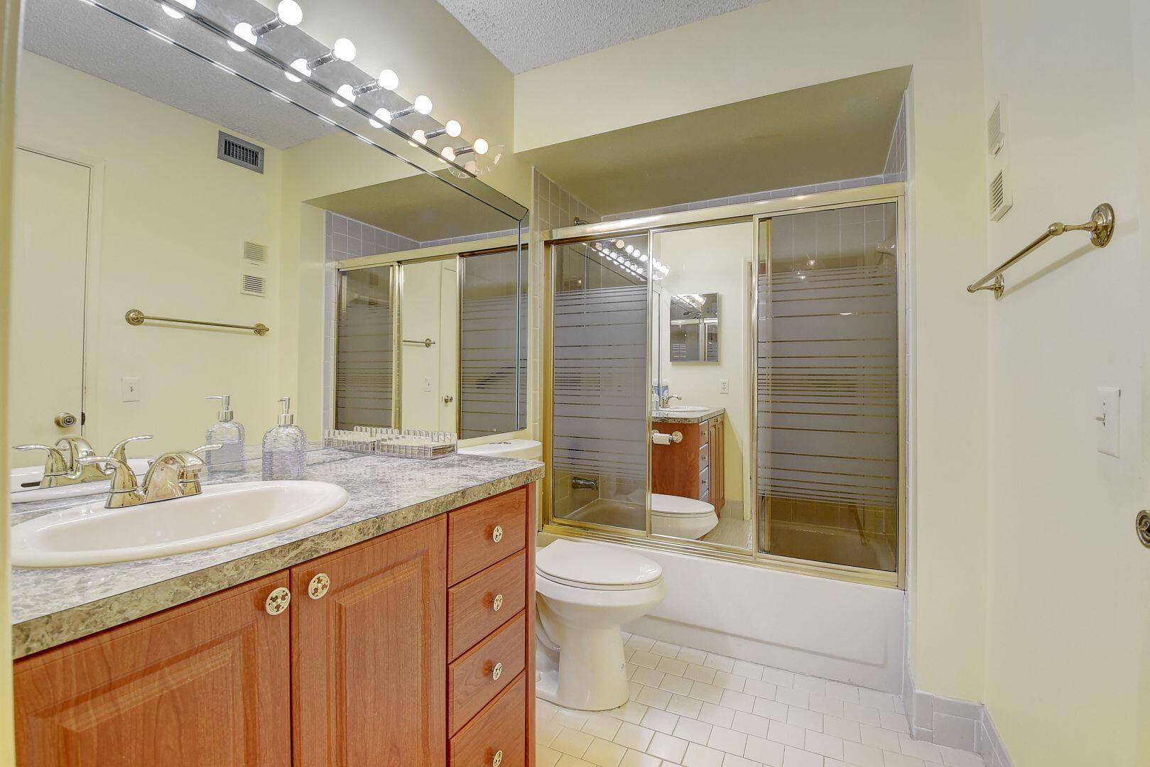 9111 Tracy Court, Unit 4 Boca Raton, FL 33496 - Photo 22 of 47 Main Bathroom